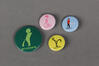 4 Badges représentant Manneken-Pis de façon stylisée <br>