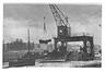 Photo Déchargement de tourbe dans le port de Bruxelles (canal de Willebroeck), photogr. anon., 1915.<br>