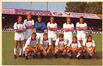 Carte-vue Equipe de football Daring Club Molenbeek posant sur la pelouse d'un stade, s.éd., s.d. [1969-1970 ?].<br>