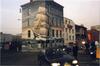 Bâtiment à l'angle Quai des Charbonnages / Rue de l'Avenir (Molenbeek-Saint-Jean) avec grande peinture murale, photogr. anon., 2006.<br>