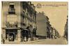 Carte-vue Rue Haeck avec, au n° 2, magasin de vêtements et chapeaux de G. Tassier 'Galeries Excelsior' (Molenbeek-Saint-Jean), éd. P.J. Flion (Bruxelles), 1923.<br>