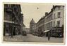 Carte-vue Rue du Comte de Flandre vue du Parvis Saint-Jean-Baptiste vers la Place Communale (Molenbeek-Saint-Jean), éd. Nels (Bruxelles) - A. Leplang (Waterloo), 1947.<br>