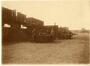 Fotokaart Verpakking van steenkool (in het Weststation, Sint-Jans-Molenbeek?), fotogr. onbekend, s.d. [rond 1916?].<br>