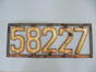Plaque d'immatriculation de la voiture de la famille Dardenne (Molenbeek-Saint-Jean), métal, s.d. [années 1920-1930].<br>